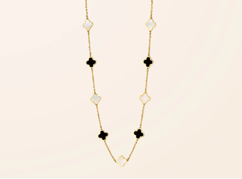 Image from: Van Der Hout Jewelry l Gold Onyx Mother Of Pearl Necklace